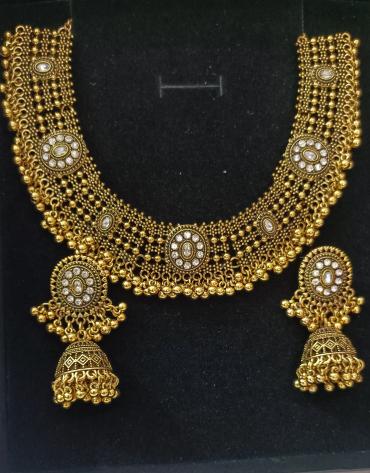 Indian brass set with silver stones