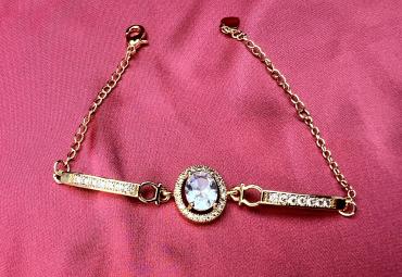 Gold plated bracelet with silver diamond