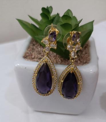 Imported golden and purple casting set with silver stone