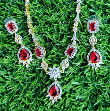 Imported silver and ruby red zircon set