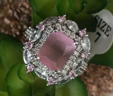 Silver ring with pink diamond