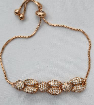 Gold plated bracelet with silver pearls