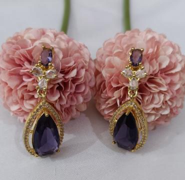 Imported golden and purple casting set with silver stone