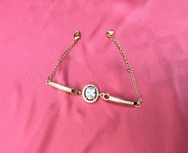 Gold plated bracelet with silver diamond