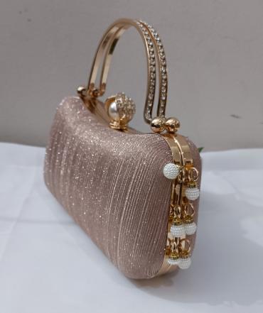 Rose gold shining clutch