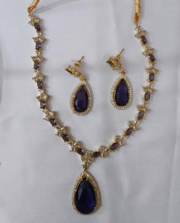 Imported golden and purple casting set with silver stone