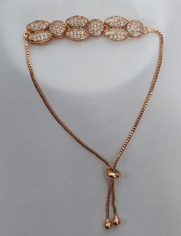 Gold plated bracelet with silver pearls