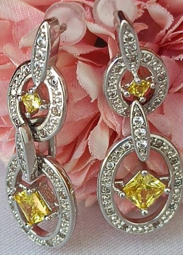 Imported silver earrings with yellow diamond