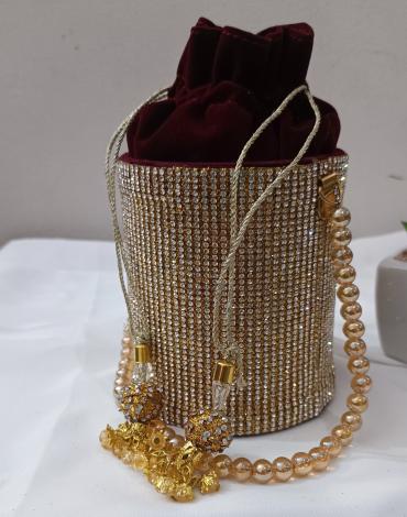 Golden glass clutch with diamond